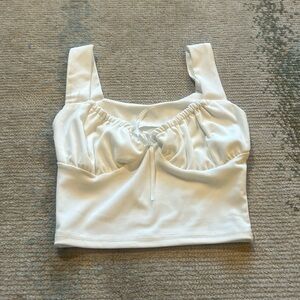 Small white tank top with bow in front